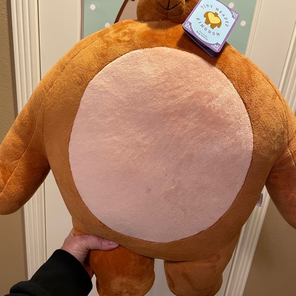 stuffed bear with tiny head
